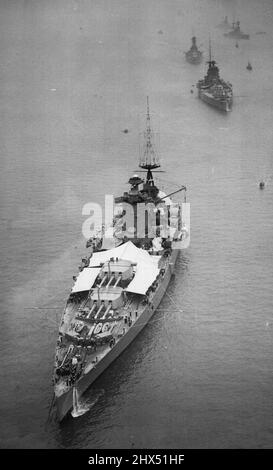 Ships Of The Home Fleet Arrive In The Thames -- An aerial view of the five battleships just off Southend, From front to back they are Nelson; Rodney; Royal Sovereign; Ramillies and Revenge. Twenty eight ships of the Home Fleet arrived in the Thames today. They are being anchored at intervals from Southend to London Bridge and the public will be able to visit them until May 12th. May 07, 1937. (Photo by Keystone). Stock Photo