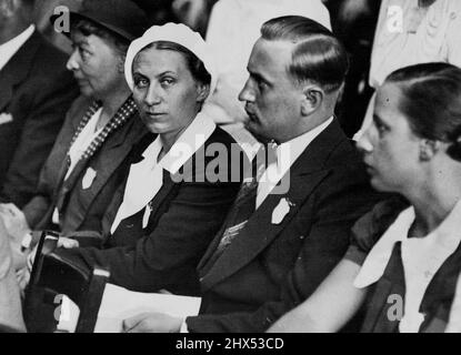 Frau Gertrud Scholtz Klink (wearing white beret) was described by Hitler as the 'perfect woman.' She is leader of women's organizations in Germany. The photograph was taken in London when she attended a conference on social work. July 28, 1936. (Photo by Sport & General Press Agency, Limited). Stock Photo