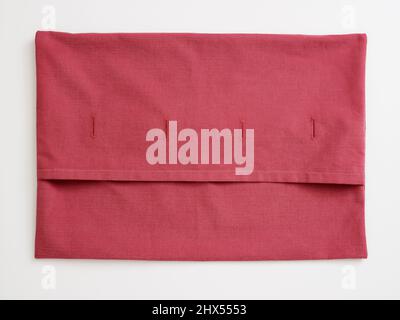 Making a bed cushion, sewing the seams, turning the cover inside out so it is the right way round Stock Photo