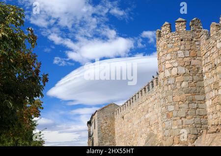 Lenticular cloud formation (Altocumulus lenticularis) over the medieval city walls of Avila, Castilla y Leon, Spain, Europe. Stock Photo