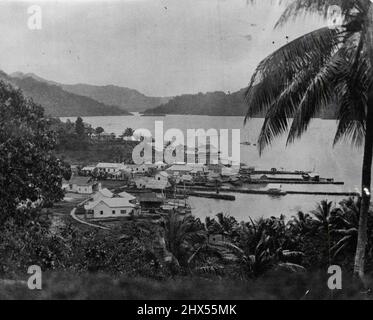 Tulagi's Chinatown in the early 1920's. The curving track seen in this picture was then the nearest approach to a road in the whole of the British Solomon Islands. November 30, 1955. Stock Photo