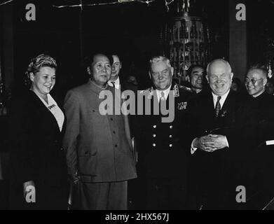 Bulganin And Khrushchev Meet Mao -- Marshal Bulganin (centre), new Prime Minister of the Soviet Union, Photographed with Mao Tse-tung, ruler of Communist China, and Nikita khrushchev (right), Secretary General of the communist party of the U.S.S.S.R., in Peking. Photograph was taken at a reception given by the Soviet Ambassador to China, P.F. Yudin, to a Soviet Delegation ***** China to partake in the Chinese national day *****. At left (holding hands with Mao) is E.A. ***** member of the Soviet delegation; between ***** Khrushchev is chou Enplai, Prime Minister ***** China. March 03, 1955. (P Stock Photo