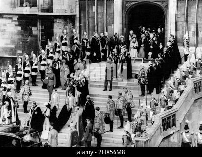 Sexcentenary of Founding of The Order of The Garter - The Procession leaving St. Georges Chapel headed by The King and Queen, followed by Queen Mary and the Duke of Gloucester, Princess Elizabeth, the Duke of Edinburgh, the Duchess of Gloucester, Princess Margaret, the Duchess of Kent and the Earl of Athlone through a Guard of Honour formed by the newly ***** Knights on either side of ***** . To-day, St. George's Day, the 600th anniversary of the Founding of the Most Noble Order of the Garter was celebrated and the new Lady and Knights of the Order were installed. April 23, 1948. Stock Photo