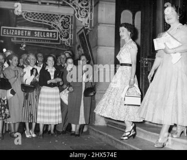 Birthday Treat - The Queen and the Queen Mother leave the new castle theatre, London, after seeing 'The remarkable Mr. Pennypacker' last night, August 4. It was the Queen Mother's 55th birthday. August 15, 1955. (Photo by Associated Press Photo). Stock Photo