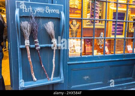 Park Your Broom' sign,signage, at entrance to Harry Potter inspired 'The Shop That Must Not Be Named' along,The Shambles,quaint,ancient,medieval,street,in,York,city,centre,popular,tourist,tourism,attraction,of,in,North Yorkshire,Yorkshire,North East England,England,English,UK,United Kingdom,GB,Great Brtiain,British,Europe, Stock Photo