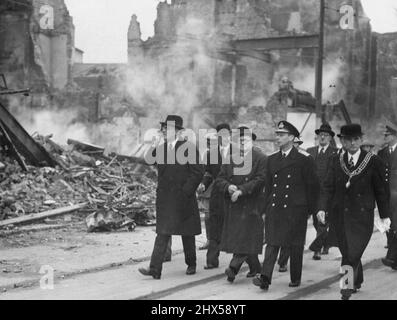 The King Inspects Southampton Damage -- The King, accompanied by Mr. Herbert Morrison, and the Mayor of Southampton, inspected the damage caused in Southampton by the recent German air raids. December 05, 1940. (Photo by L.N.A.). Stock Photo