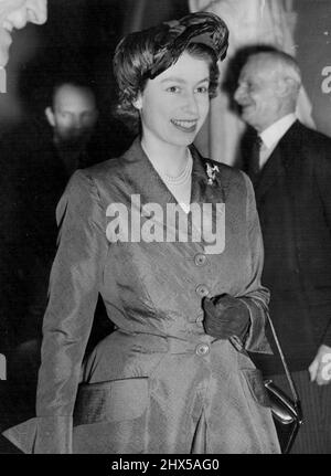 Princess At Royal College Concert. Princess Elizabeth smiles as she arrives at the Royal College of Music in South Kensington, London, where she attended a special concert before presenting college prizes and medals. December 6, 1951. Stock Photo