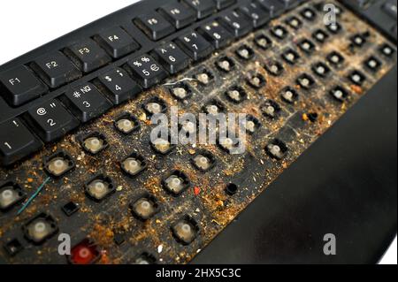 very dirty black disassembled keyboard close-up Stock Photo