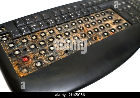 very dirty black disassembled keyboard close-up Stock Photo