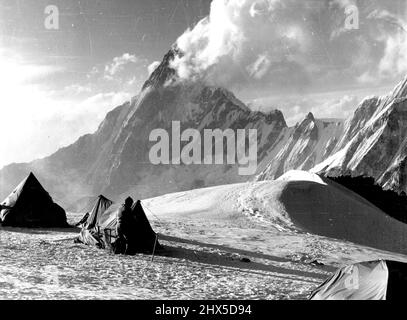 British Everest 1955 Expedition -- The camp set up on Mera Col by the Everest Expedition during practice climb. In the background is Amadalam. May 14, 1955. Stock Photo