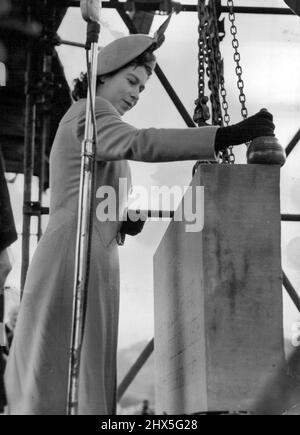 Princess Elizabeth laying the foundation stone of the new St. Mary’s College, at Durham, recently. During her visit to the Picturesque city, the Princess inspected the historic cathedral and listened to singing by choristers. October 31, 1947. (Photo by Associated Press Photo). Stock Photo