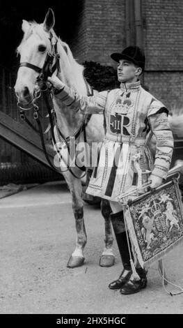 His Coronation Splendour In full ceremonial dress at knights bridge Barracks today during a rehearsal was trumpeter A.E. D'Arcy, of sidcup, one of the State Trumpeters of the Household Cavalry who will sound a fanfare at the Coronation of Queen Elizabeth. March 18, 1953. Stock Photo