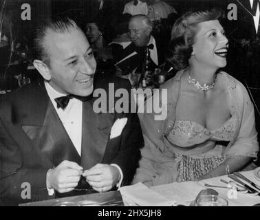 Singer Dinah Shore with husband George Montgomery at a party Stock ...