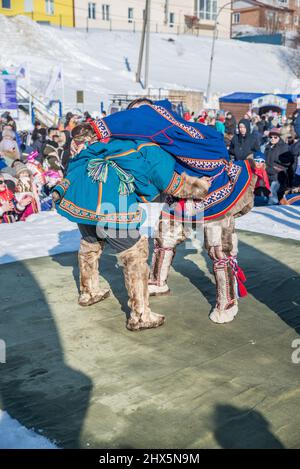 Traditional Nenet wrestling competition at Reindeer Herders Festival in Salekhard, Yamalo-Nenets Autonomous Okrug, Russia Stock Photo