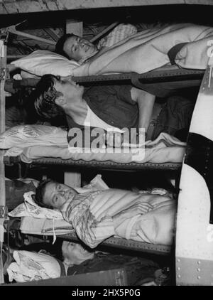POW's Home From Korea -- Some of the stretcher cases wait to be unloaded in the RAF plane which brought them home from Japan to Lyneram, Wilts., this afternoon, when 22 of the released British prisoners of war from Korea were brought back. May 1, 1953. Stock Photo