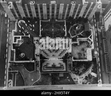 The Garden Of The Nations -- Here are the famous gardens of the nations at Rockefeller Centre, New York City, shortly after they were thrown open to the public Apr. 15. Taken from the top of an adjoining building, this picture shows the gardens as they look to roof strollers. Nations represented are France, Holland, Italy, Spain and Japan. In the Center is an unique modern garden. April 15, 1935. (Photo by Associated Press Photo). Stock Photo