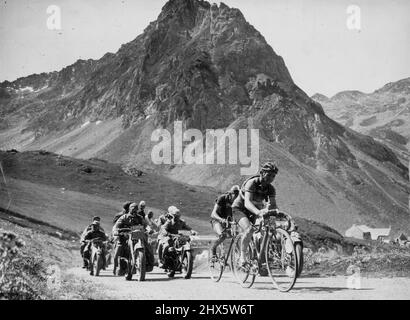 Drugs by pill, powder or injection help riders to stave off exhaustion in the long, gruelling race. October 24, 1950. (Photo by Sports And General Press Agency Limited). sports, sport, athlete, athletic, Stock Photo