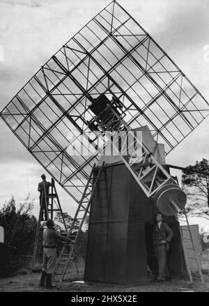 Radio Telescope. Can see the sun from sunrise to sunset. Regardless of the weather. This shot shows the telescope with radio astromers from the C.S.ISO. at the Potts hills station. This work is Auto' recording the suns rays. Such as sun spots etc. The weather close to the earth has no effect what so every,. This machine is one a few in the world and the all help U.K. & U.S.A. India. To keep to sun under observation. The radiophysic division of the C.S.I.R.O. Sydney Uni runs this field unit... Ju Stock Photo