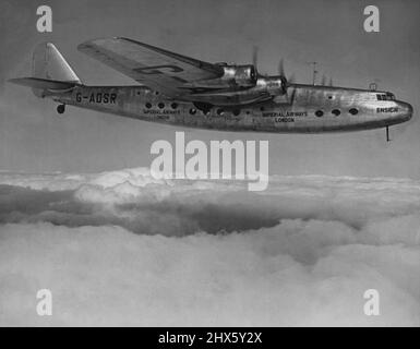 Britain's Largest Landplane Airliner -- First passenger flights, with more than thirty on board, have just been successfully completed at Croydon by 'Ensign', leader of the new fleet of 14 Armstrong Whitworth 40-passenger all-metal airliners of the 'E' class. These 21-ton craft are to go into service on Empire and European routes. Luxury travel at a top speed of more than 200 miles an hour (320 km./h.) is provided by the 'Ensign' which enjoys 'four-engine safety' with four Armstrong Siddeley Tig Stock Photo