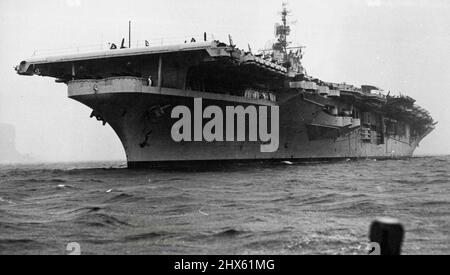 US Navy task Force 38 arrives on cruise -- Flagship of the Force under the command of Rear Admiral H.M. Martin, USN is the aircraft Carrier valley Forge which is shown entering the Headsin heavy rain yesterday morning. January 30, 1948. (Photo by Frederick John Halmarick/Fairfax Media). Stock Photo
