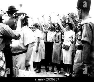 Jewish Women Demonstrate against White Paper In Jerusalem -- Jewish Girls shouting 'Down With The White Paper', during the demonstration in Jerusalem. Thousands of Jewish women gathered in the streets of Jerusalem, and Demonstrate against the British (Government) white paper. They carried banners bearing the sign of David. They marched to the District Commissioners Office, while loud speakers on the roof Ordered time to Disperse. When they Attempted to March of the British Military Headquarters Stock Photo