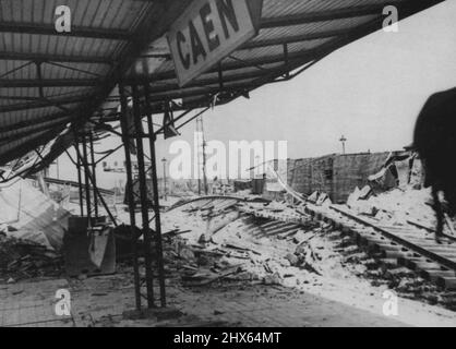 French Communication Center Wrecked -- The station and yards of the important French railway center of Caen, on the Paris-Cherbourg main line, lie in ruins following the capture of the city by the Allies. The city underwent heavy shelling and aerial bombardment during the battle for the German Stronghold. July 31, 1944. (Photo by Associated Press Photo). Stock Photo