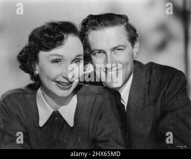 Googie Withers & Joan McCallum. Googie Withers stars in Seven's Friday daytime (11.55) movie, 'Devil On Horseback'. The Australian sunshine she'd heard so much about didn't disappoint Britain's top actress Googie Withers when she arrived in Perth. April 8, 1953. Stock Photo