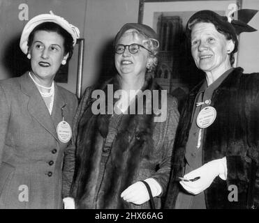 Miss Beatrice Wines-Miller (Hobart) with Miss Beatrice Wines (Sydney), president of the Business and Professional Women's Club, and Mrs. C. Nicholls (Melbourne) at the civic reception given by the Lord Mayor, Alderman P. D. Hills, at the Town Hall yesterday for delegates to the federation's conference, now being held in Sydney. September 12, 1955. (Photo by Bert Power/Fairfax Media) Stock Photo