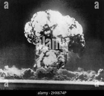 Atom Blast Churns Earth -- A second after an atomic device, more than 1½ times as powerful as the bombs which devastated Hiroshima and Nagaski, was detonated atop a 500-foot tower at dawn today, this churning fireball tore at the earth and sucked up clouds of dirt from the desert floor. An atomic blast. May 05, 1955. (Photo by AP Wirephoto). Stock Photo