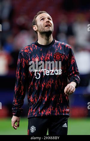 MADRID - FEB 23: Juan Mata warms up prior to the Champions League match between Club Atletico de Madrid and Manchester United at the Metropolitano Sta Stock Photo