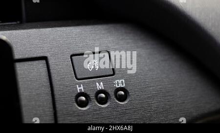 Car speedometer lights dimmer switch and time setting buttons Stock Photo
