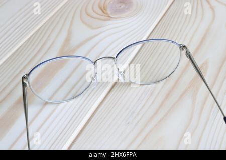 Modern stylish glasses on a vintage white wooden table. Stock Photo