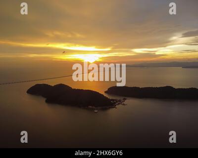 Aerial view dramatic sunset cloud over Pulau Aman Island Stock Photo