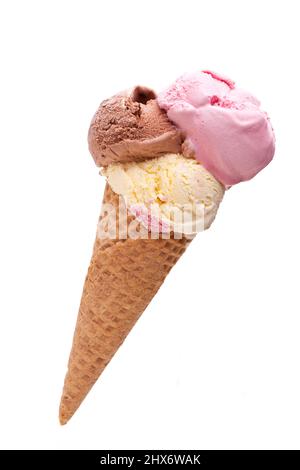 A diagonal ice cream cone with three different scoops of ice cream Stock Photo