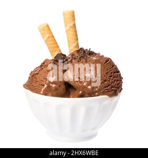 Chocolate ice cream scoops in white bowl with waffles and chocolate pieces on white background Stock Photo