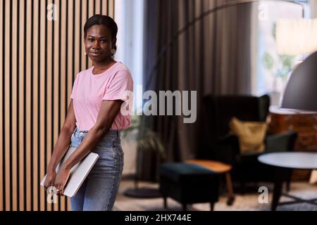 Young woman looking at camera Stock Photo