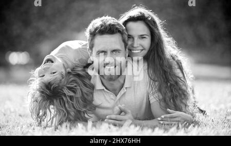 mom dad and son love relax together. adoption and charity. family day. friendship. Stock Photo