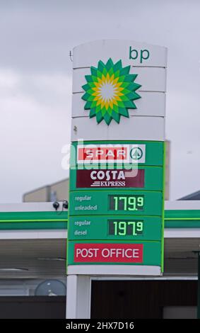 A display sign showing unleaded petrol prices at 179.9 p per litre and diesel prices at 197.9p per litre at a BP petrol station in Liverpool's city centre. Picture date: Thursday March 10, 2022. Stock Photo