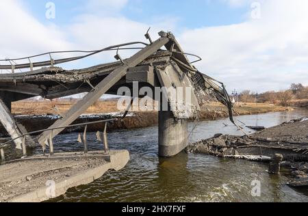 IRPIN, UKRAINE - Mar. 09, 2022: War in Ukraine. Chaos and devastation on the outskirts of Irpen. Damaged bridge as a result of rocket attack and bombardment of a peaceful city Stock Photo