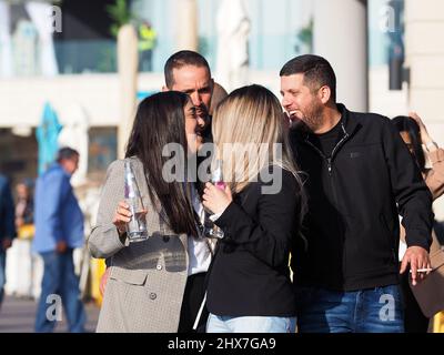 ASHKELON, ISRAEL - MARCH 04, 2022: Young people have fun in the company. Stock Photo