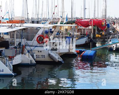 ASHKELON, ISRAEL - MARCH 04, 2022: Yachts in a yacht club on the mediterranean sea. Stock Photo