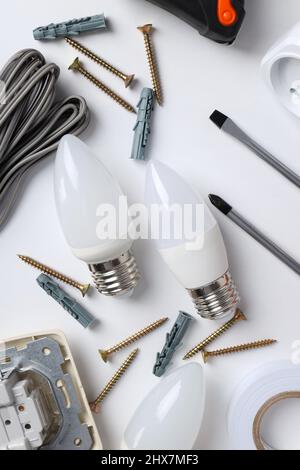 Concept of electrician or electrical tools on white background Stock Photo
