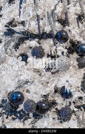 White Christmas tree with blue ornaments, USA Stock Photo