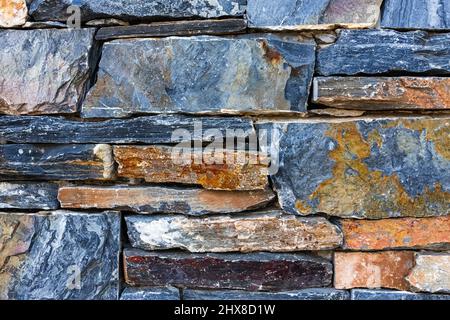 Walls made of multicolor stones , Stone background. Ancient stone wall. Grunge stone wall backdrop. Background of old vintage stone wall. Wall decorat Stock Photo