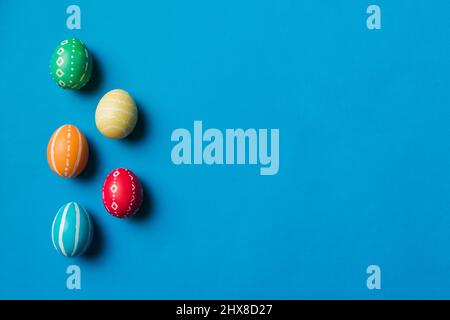 holiday preparation Multi colors Easter eggs on colored background . Pastel color Easter eggs. holiday concept with copy space. Stock Photo