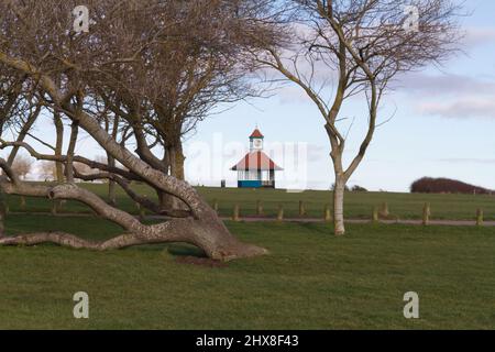 Clock tower on the greensward at Frinton-on-Sea in Essex Stock Photo