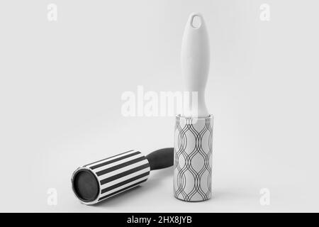 New lint rollers on light background Stock Photo