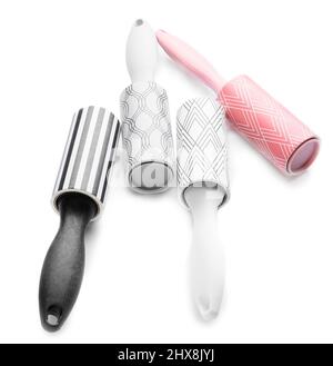 New lint rollers on white background Stock Photo