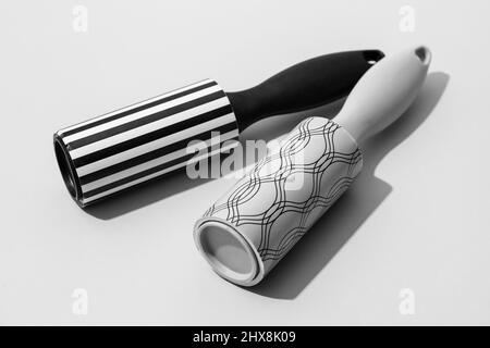 New lint rollers on light background Stock Photo