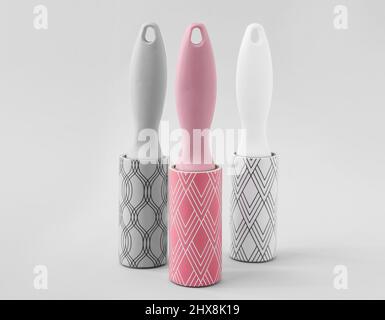 New lint rollers on light background Stock Photo